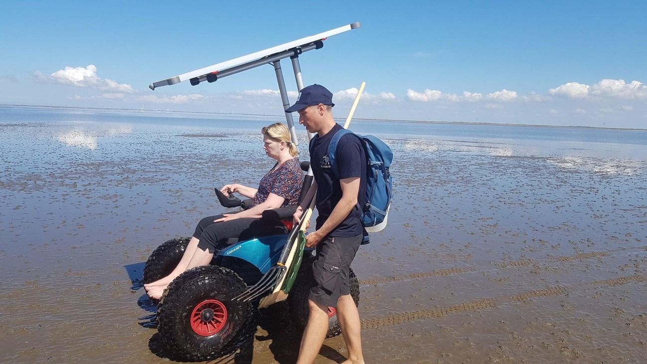 Kørestol på stranden